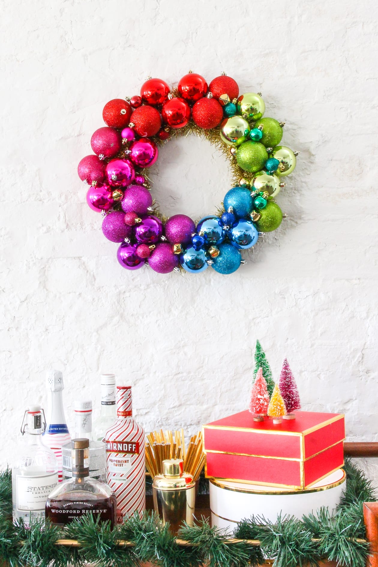 diy-Ornament-wreath-4 DIY Ornament Wreath above a holiday styled bar cart