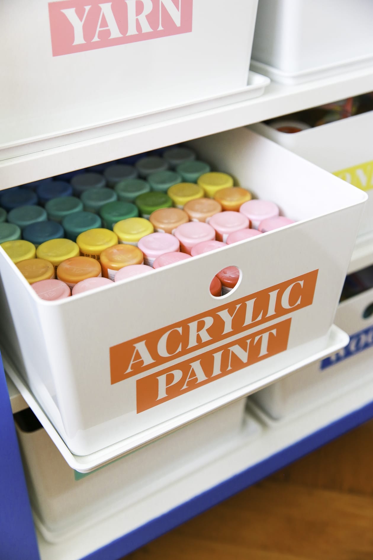 Organize your craft room with this easy DIY project! Making your own craft room labels is as easy as pressing print. Plus DIY Craft Room Labels are a great way to add color to your organization.