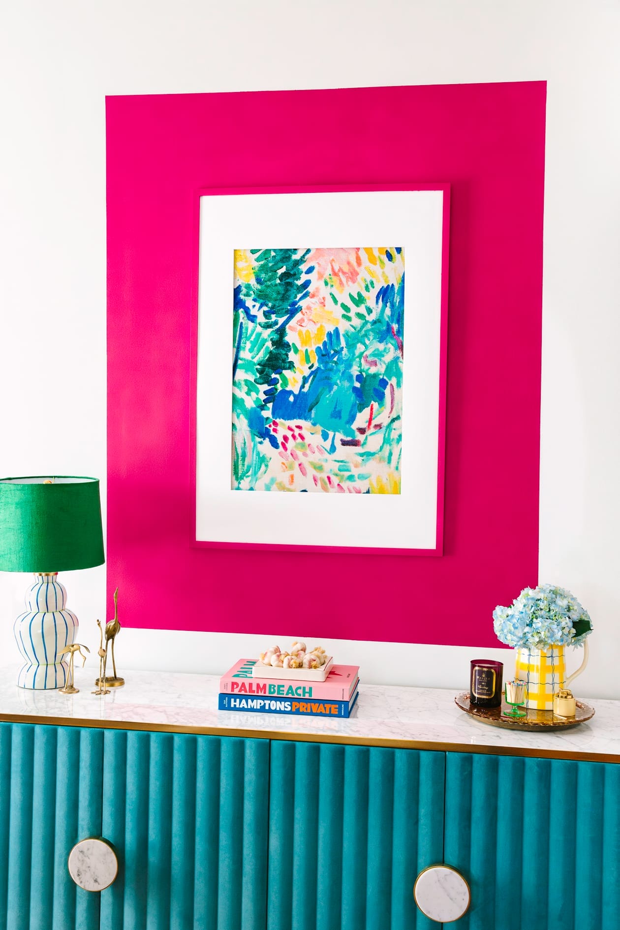 diy-large-wall-art-7 Living room with large colorful art hanging above a styled buffet